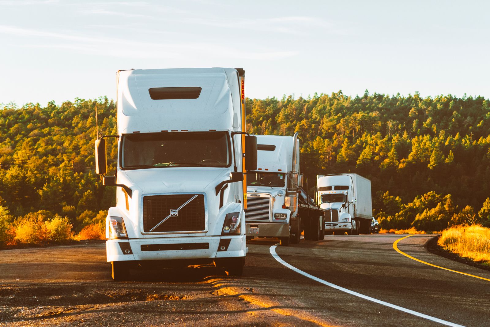 Freight trucks on a highway, the way portable containers travel